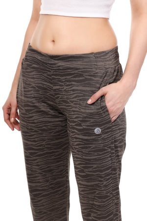 Zebra-patterned pants worn by a person on a white background